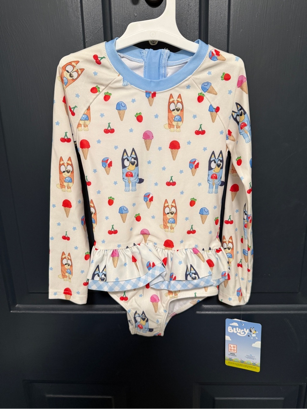 Bluey Girls' Long-Sleeve One-Piece Swimsuit in Cream with Blue Trim